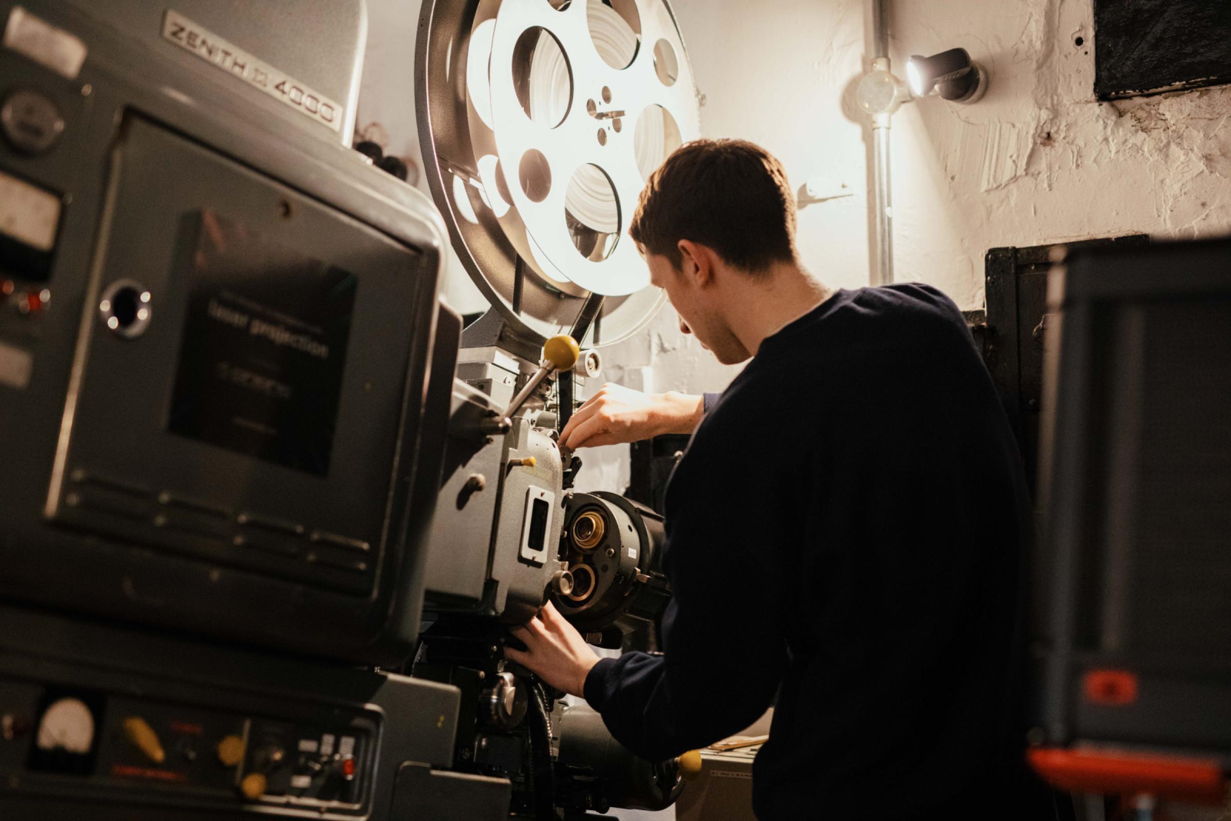 Owen projecting 35mm film